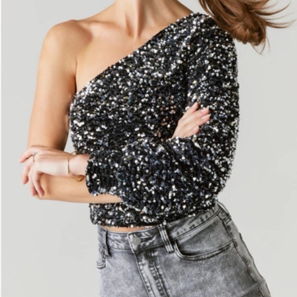 Audrey Parks for Francesca’s sequin one arm top- worn a few times. 56 retail